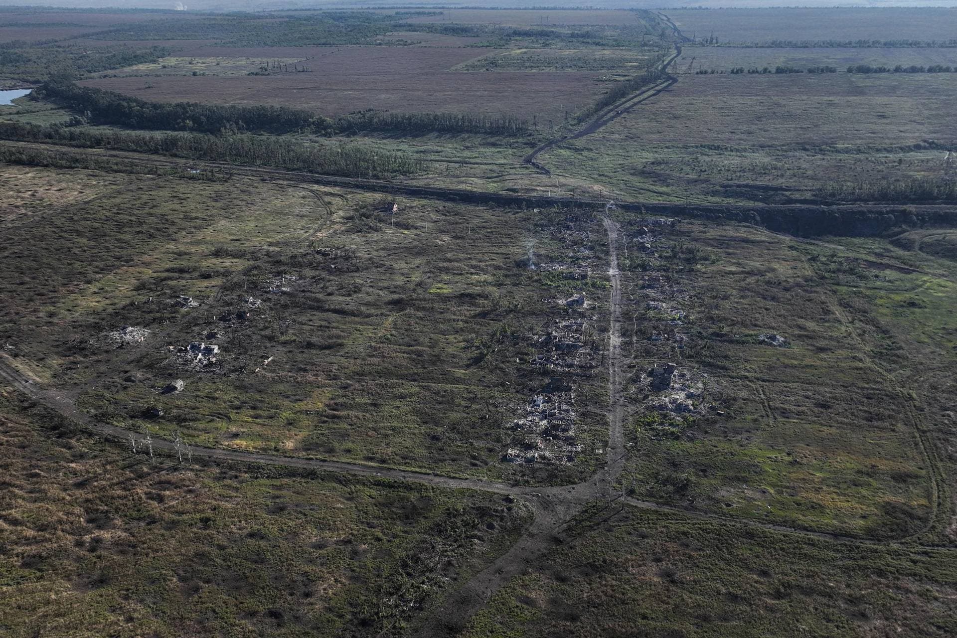 This drone image shows houses seen destroyed during the fighting between Russian and Ukrainian armed forces are seen in Andriivka