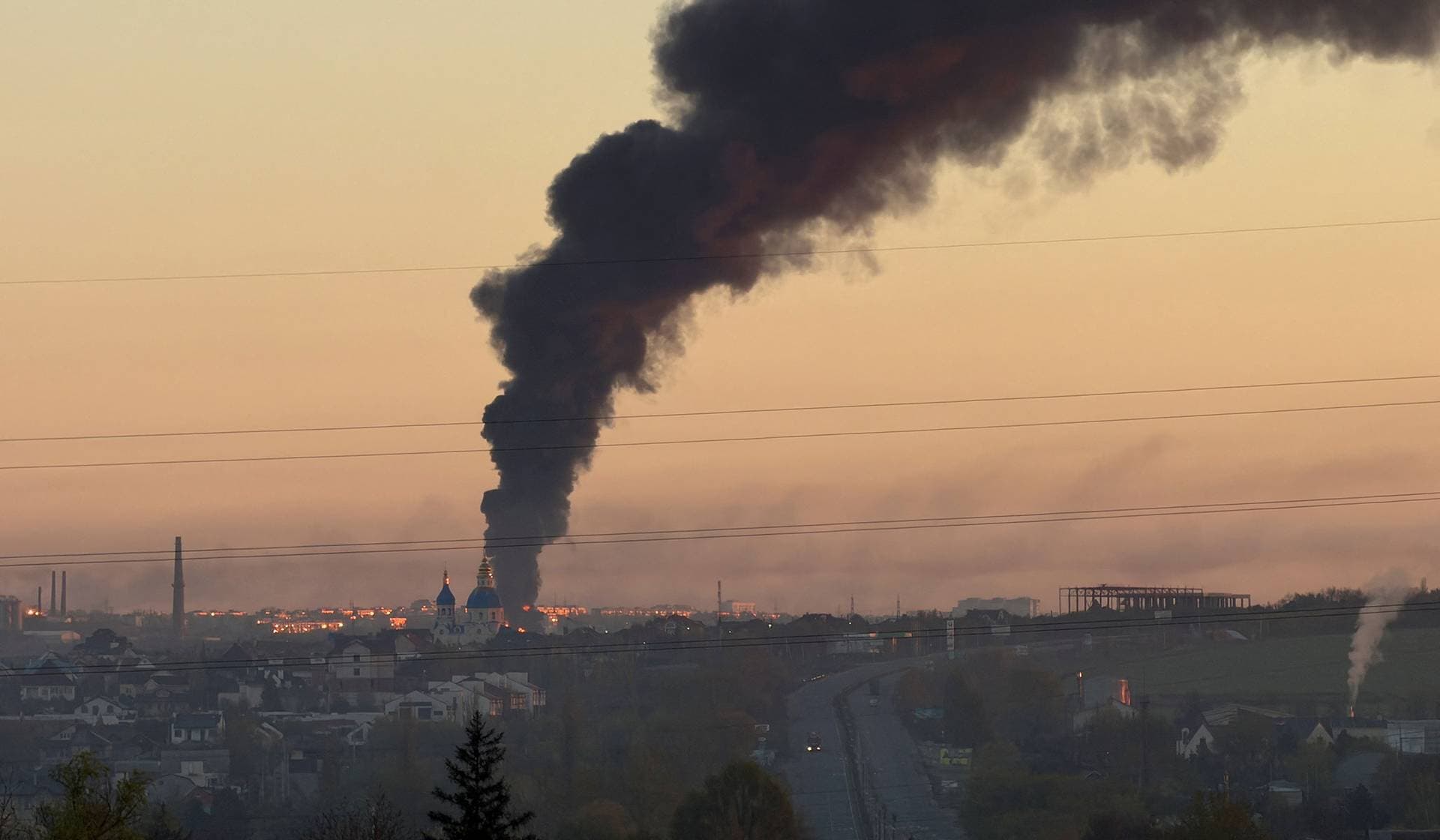 Smoke rises in the city after a Russian drone and missile strike in Dnipro