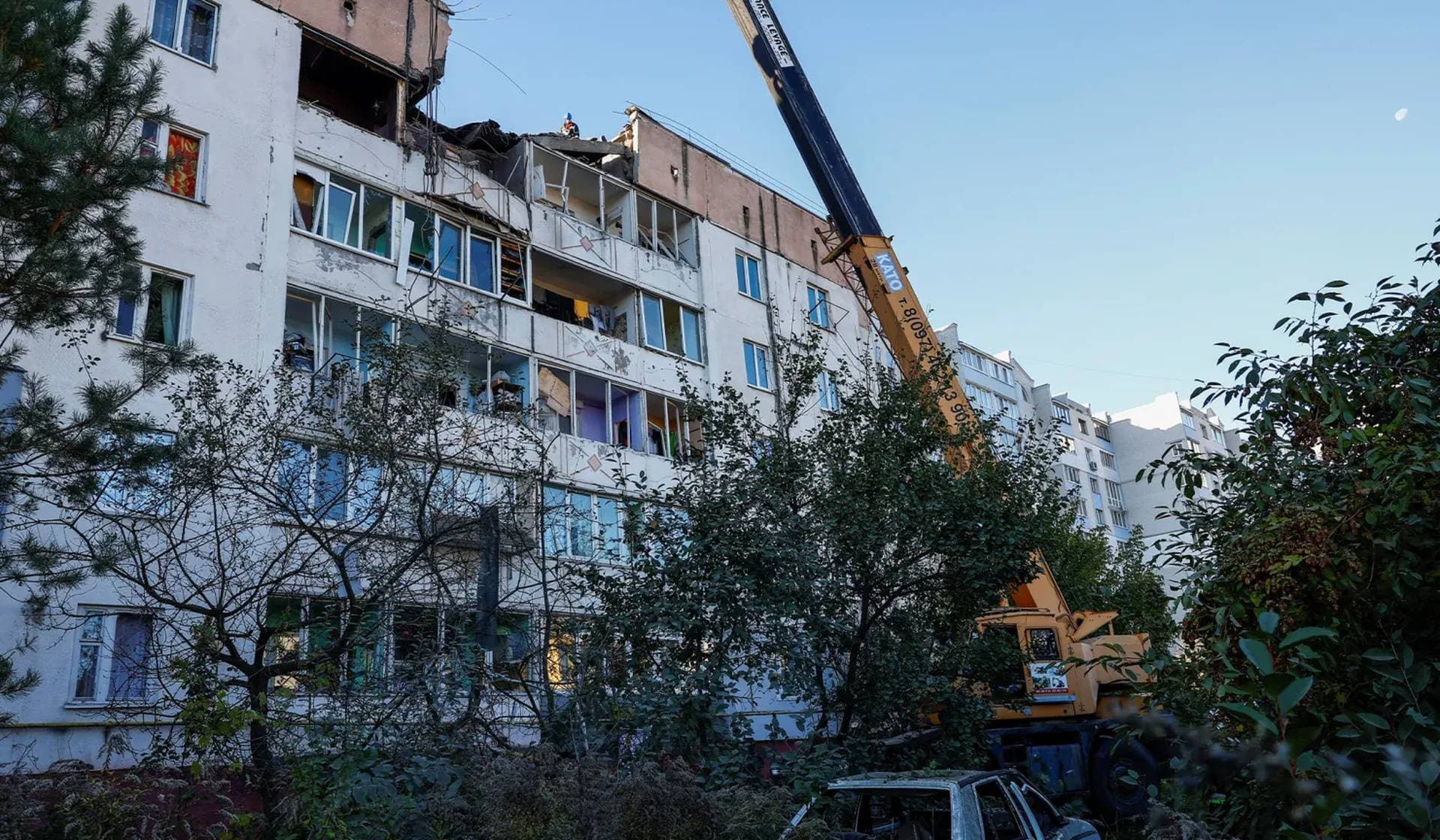 A view shows an apartment building damaged during a Russian drone strike in the town of Hlevakha
