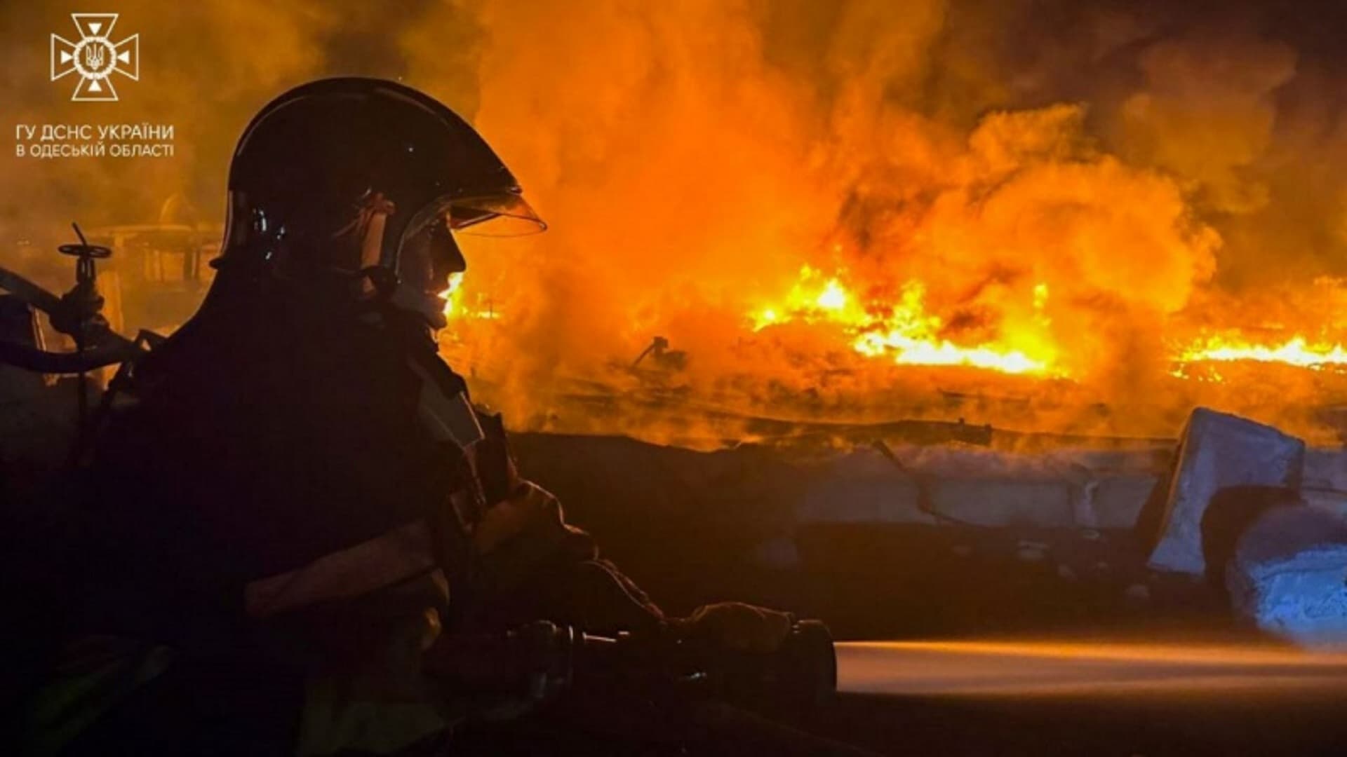 A firefighter works at a site which was hit during Russia's drone attacks in Odesa region