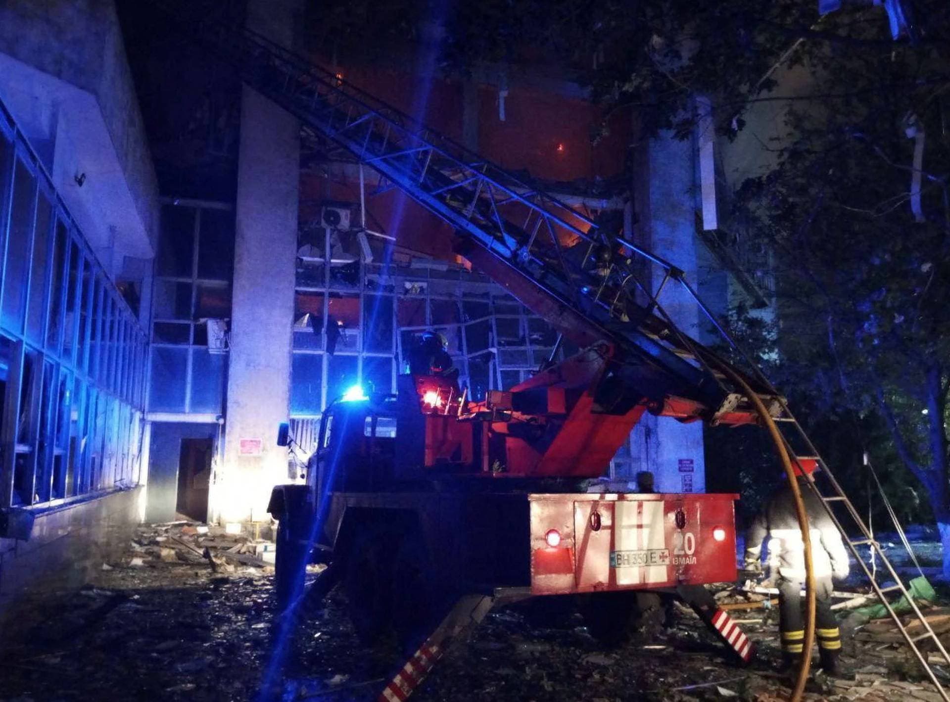 Rescuers work on a scene of drone attack in Odesa region