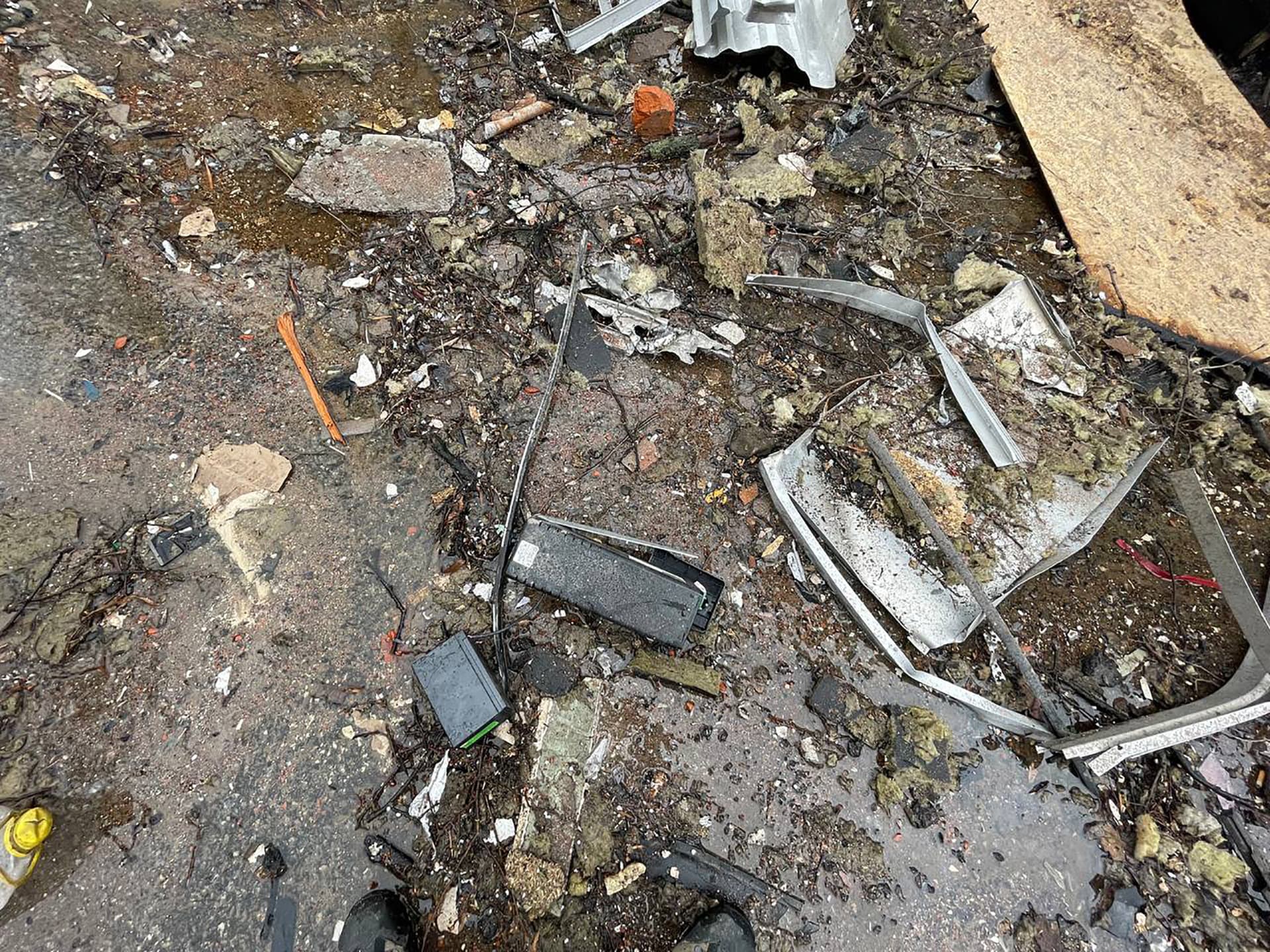 Shards of destruction on the asphalt in Kharkiv
