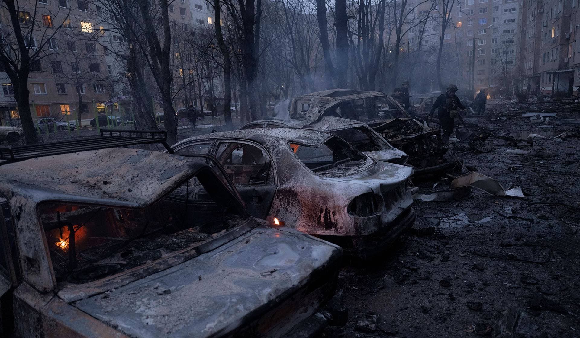 Police officers work at the site of apartment buildings hit by a Russian air strike in Kramatorsk