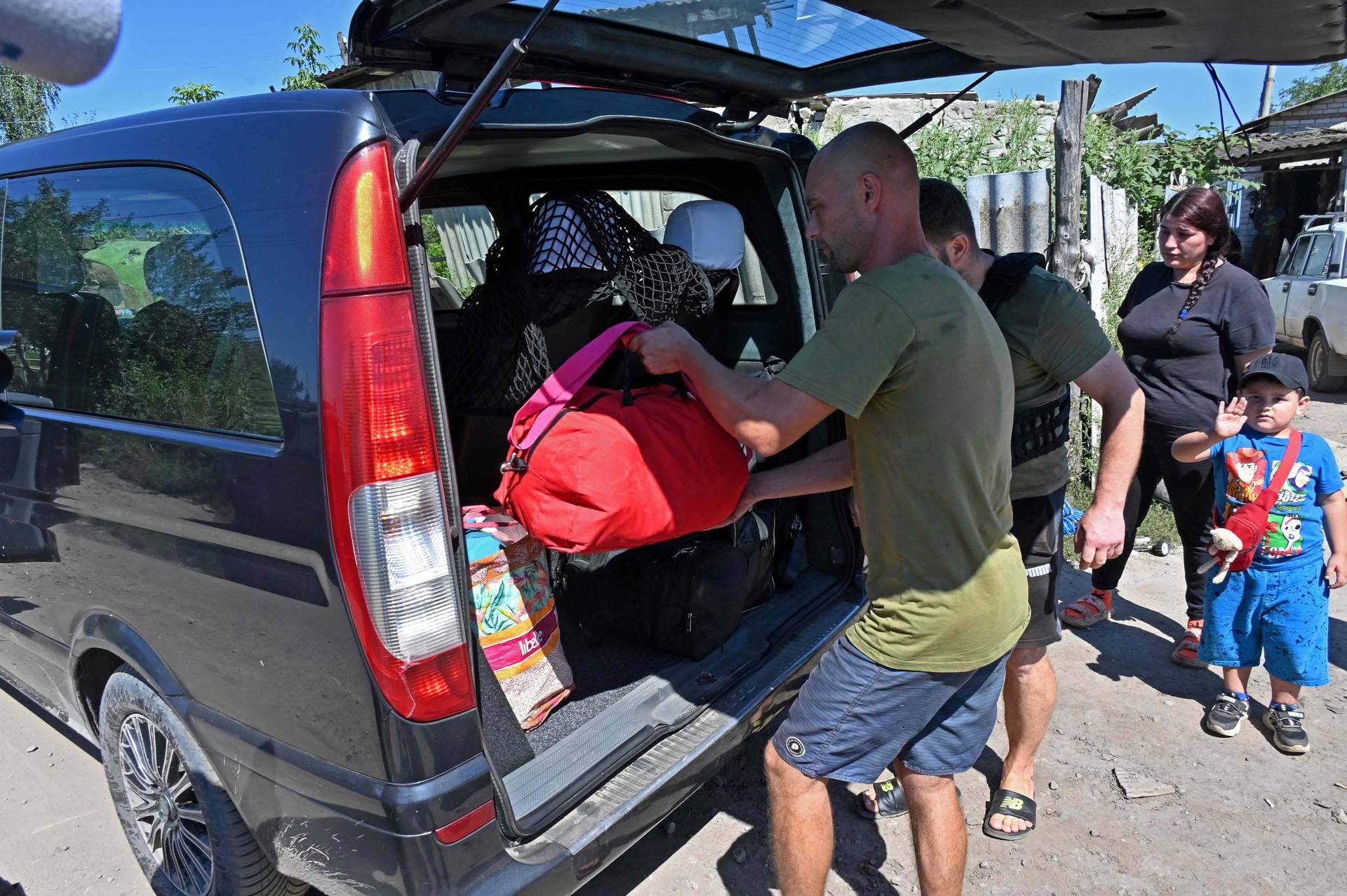 Volunteers help local residents to evacuate from Kruglyakivka village, near Kupiansk