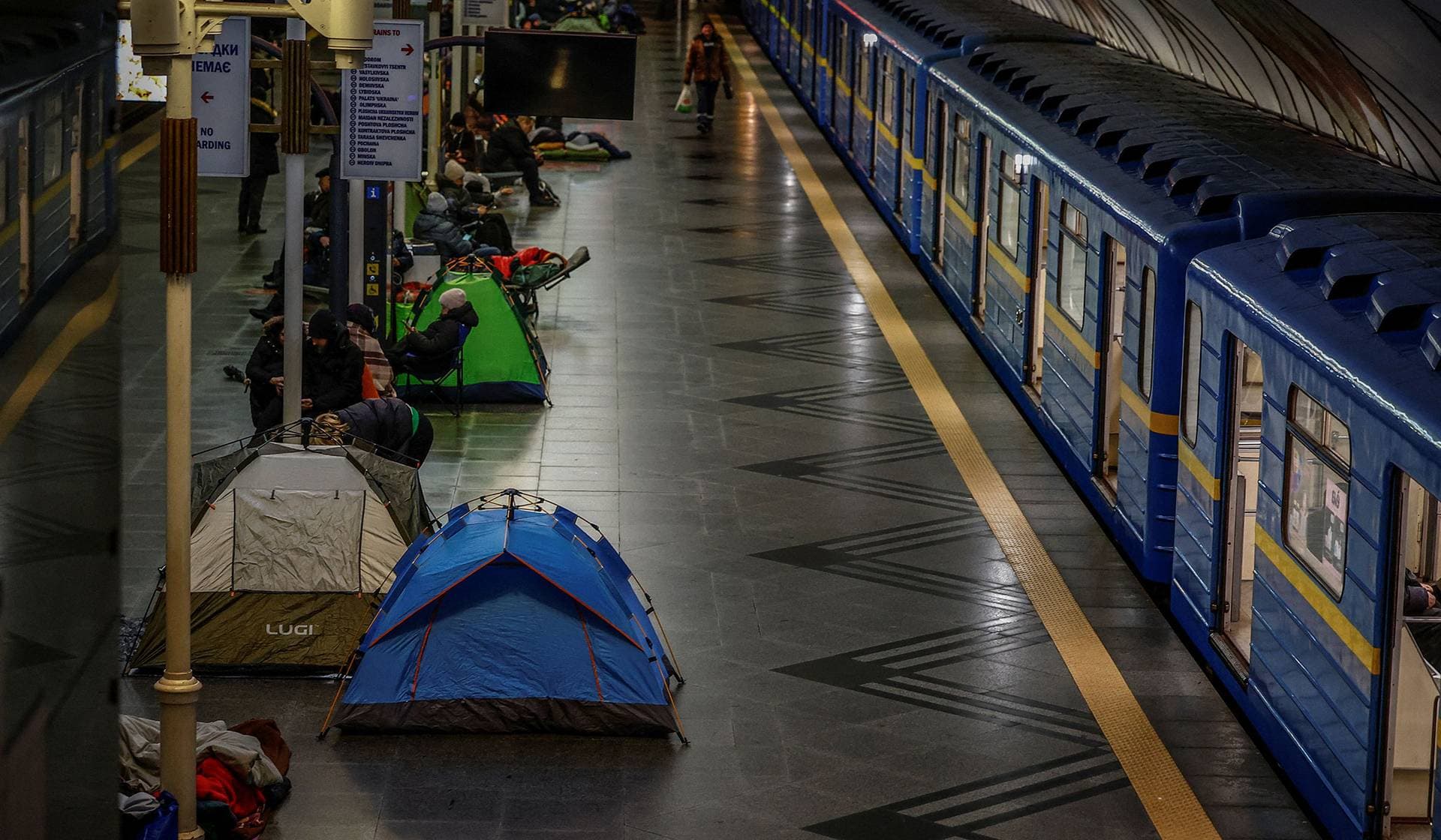 Residents take shelter inside a metro station during an air-raid alert as overnight Russian drone and missile strike continues across the country in Kyiv
