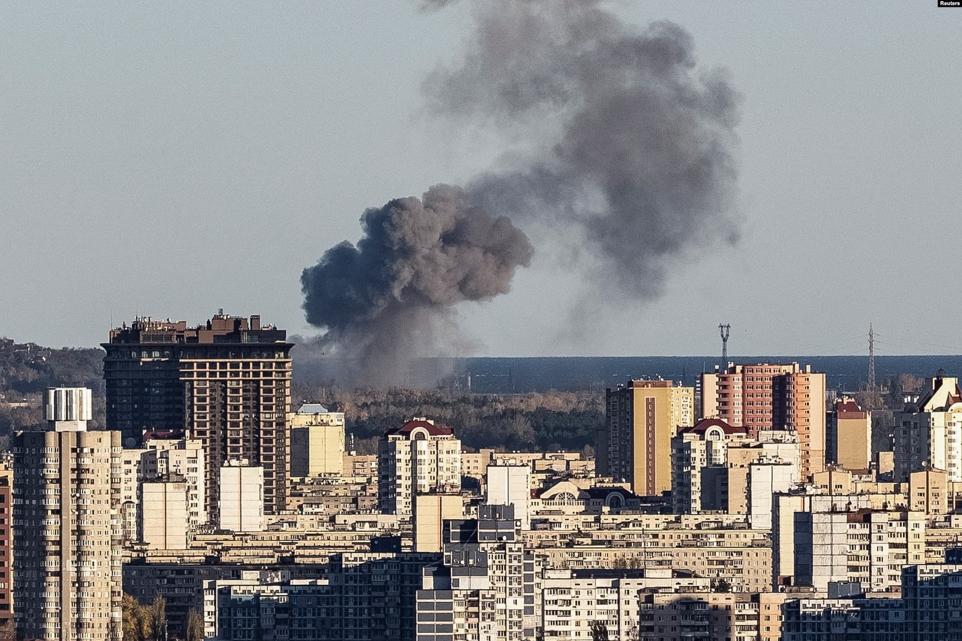 Smoke rises on the outskirts of the city during a Russian missile attack