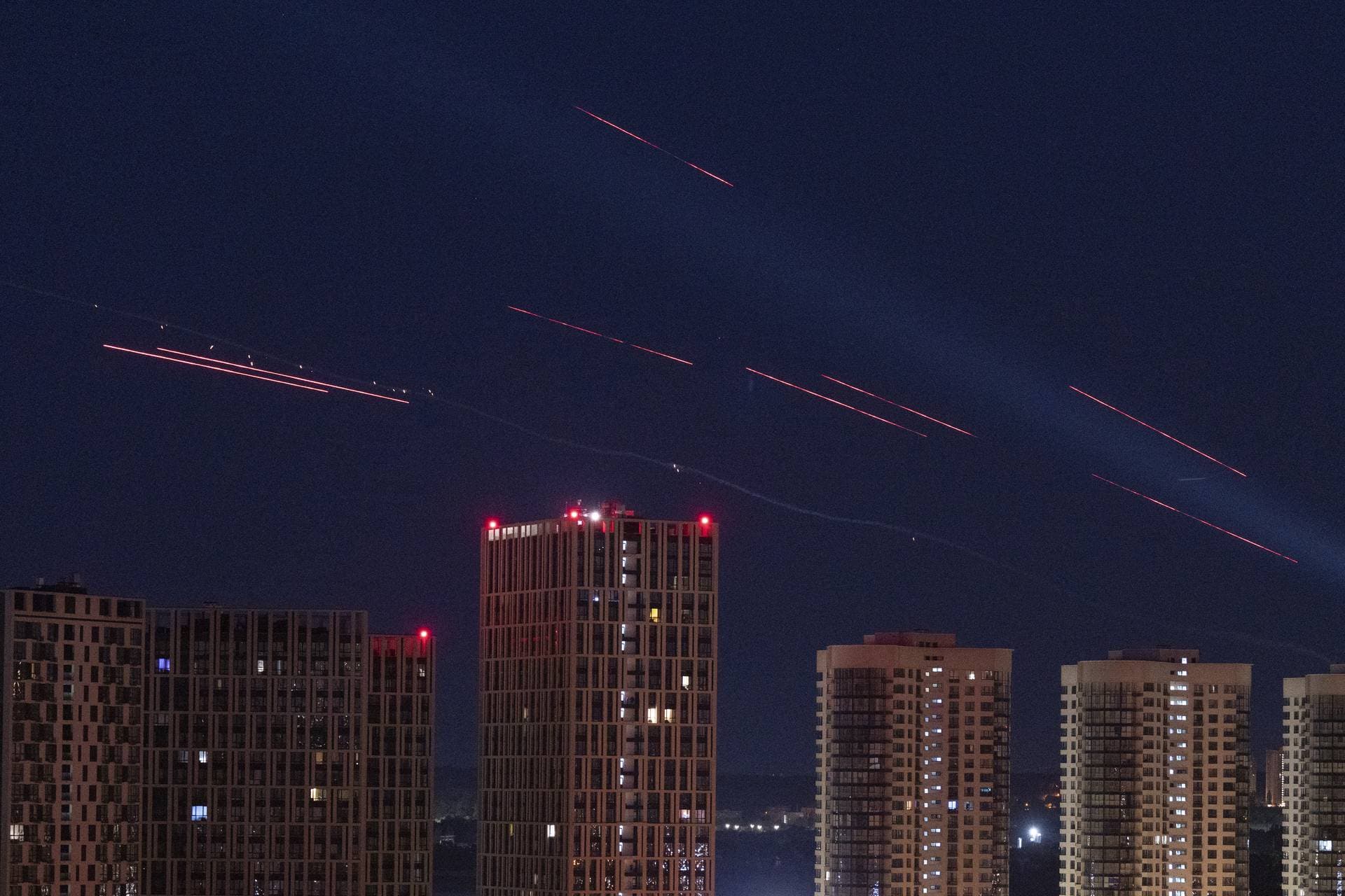 Ukrainian air defenses fire to stop drones in a relentless wave of bombardments targeting Kyiv early Tuesday morning in Kyiv