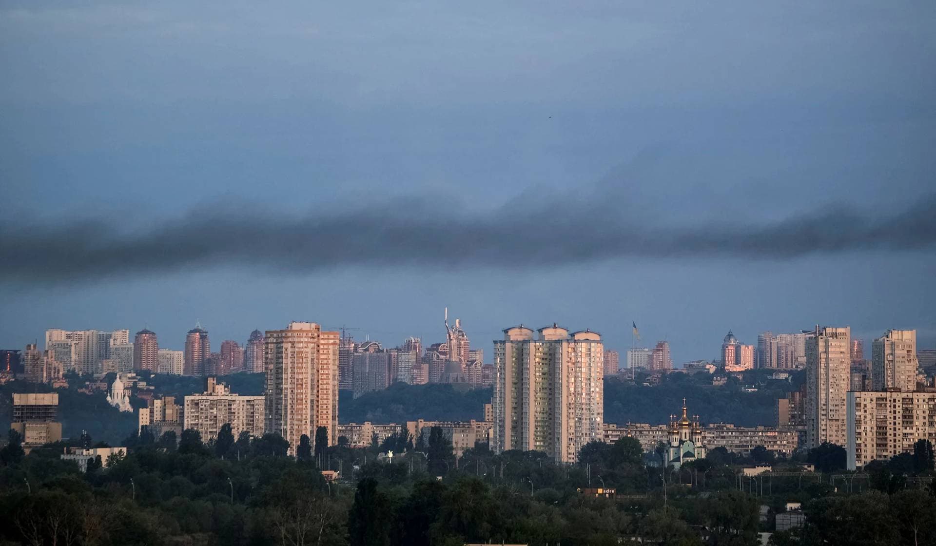 Smoke rises after a Russian missile strike in Kyiv