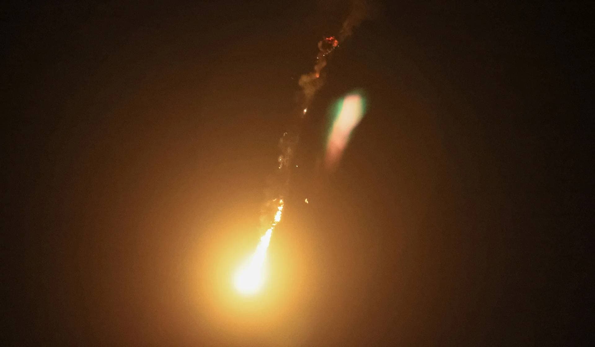 Explosion of a drone in the sky over the city during a Russian drone strike in Kyiv