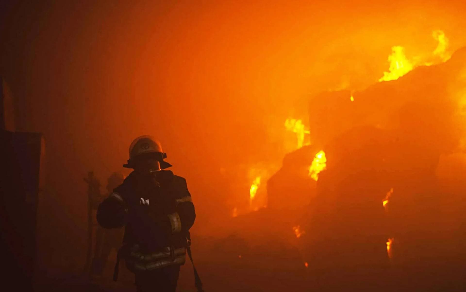 Emergency services tackling a fire after the drone attacks in Kyiv