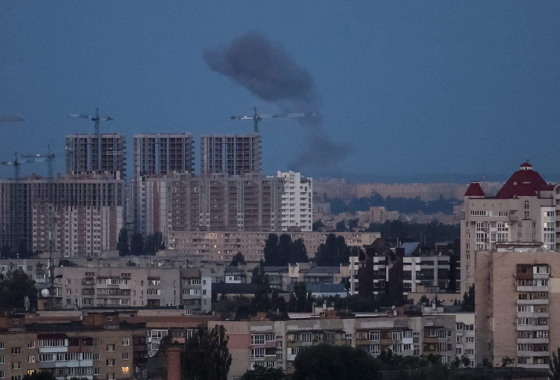 Smoke rises in the sky over the city after a Russian missile strike in Kyiv