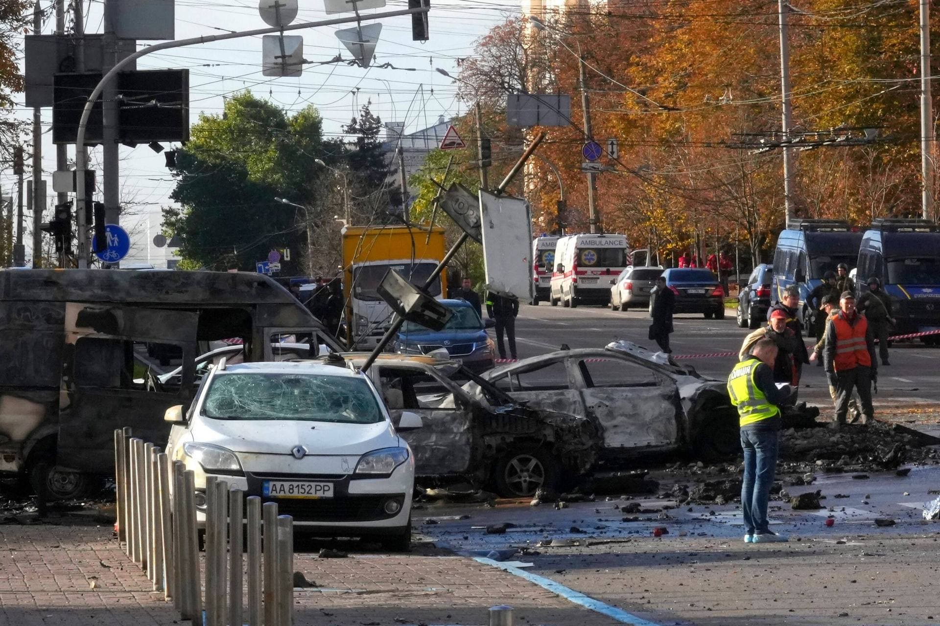 Police inspect the scene of Russian shelling in Kyiv