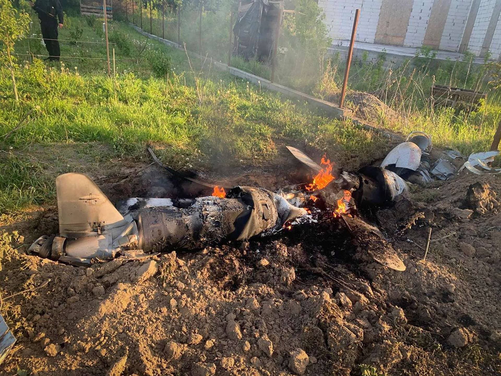 A Russian cruise missile shot down by Ukrainian Air Defence Forces in the backyard of a private house in Kyiv Region