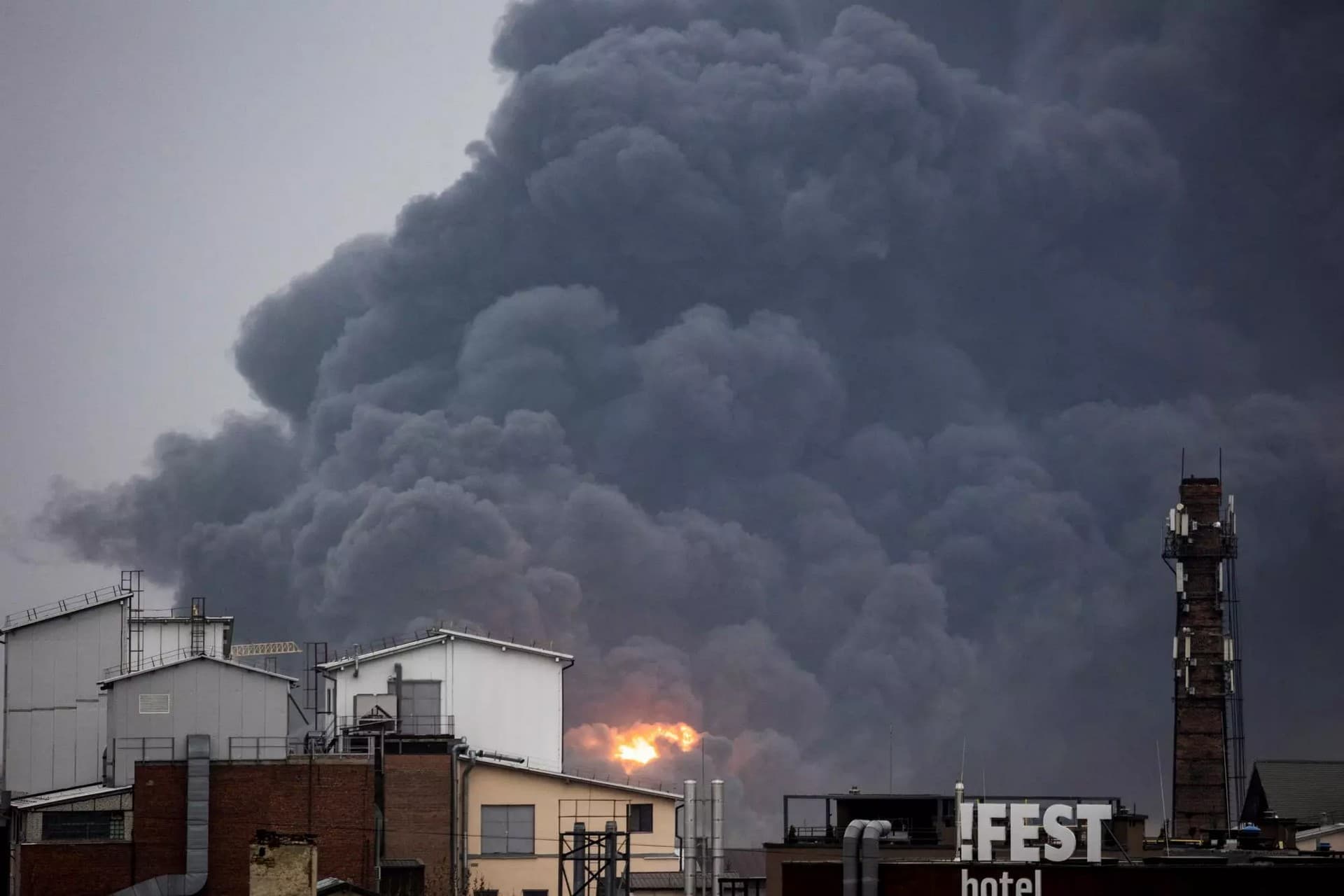 Smoke rises after an air raid, as Russia's attack on Ukraine continues, in Lviv