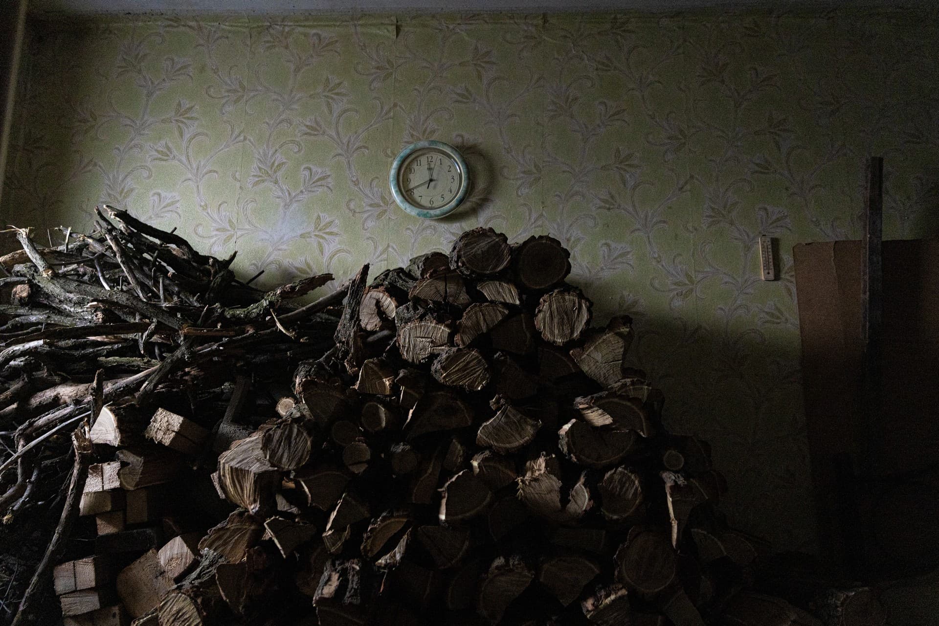 residents in the town of Lyman install firewood stoves inside their apartments and collect firewood to stay warm