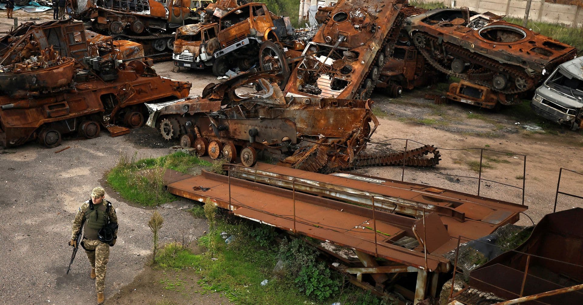 Destroyed Russian tanks and armored vehicles in the recently liberated town of Lyman
