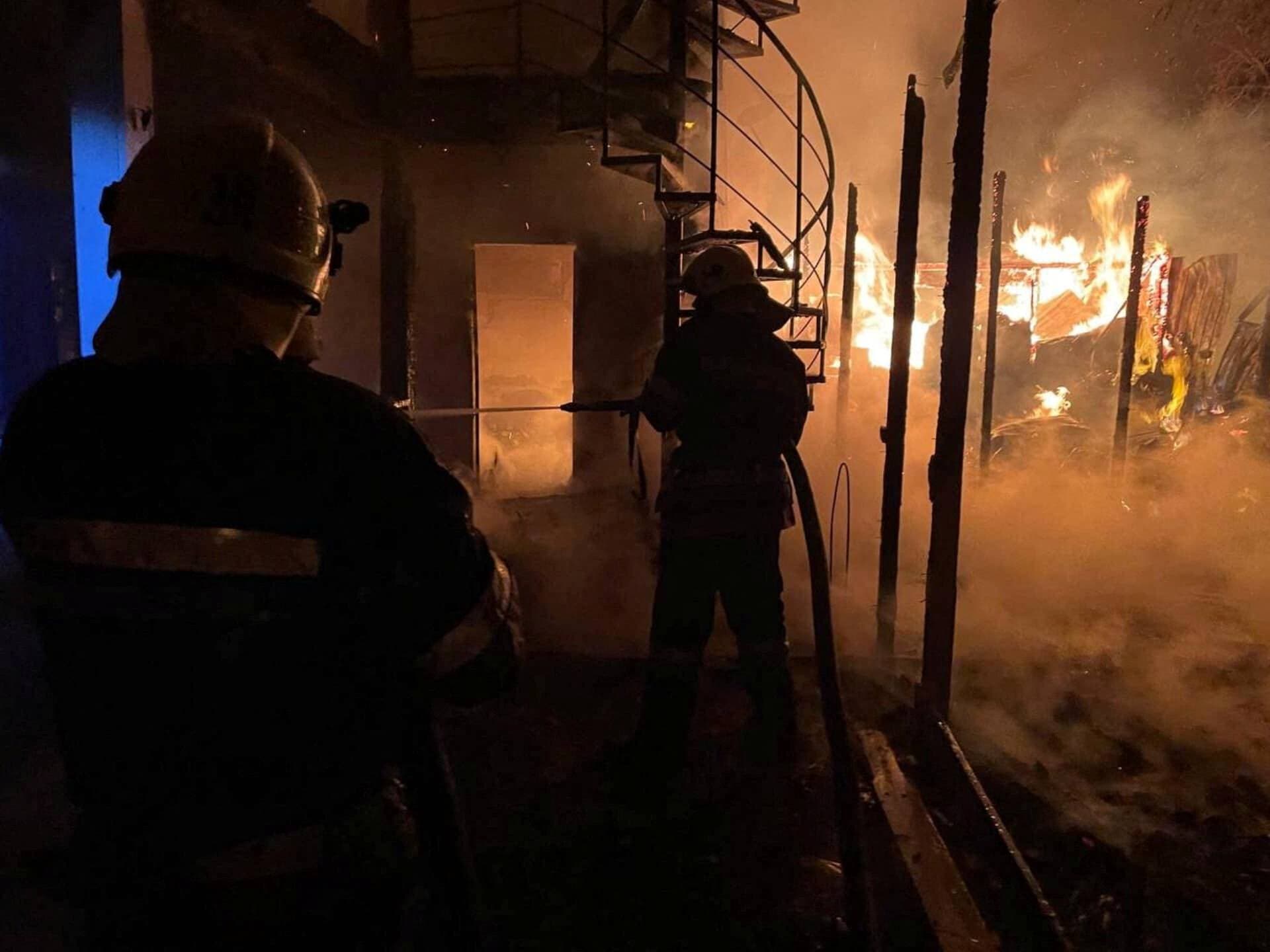 burning storage facilities heavily damaged by a Russian missile strike in Odesa region