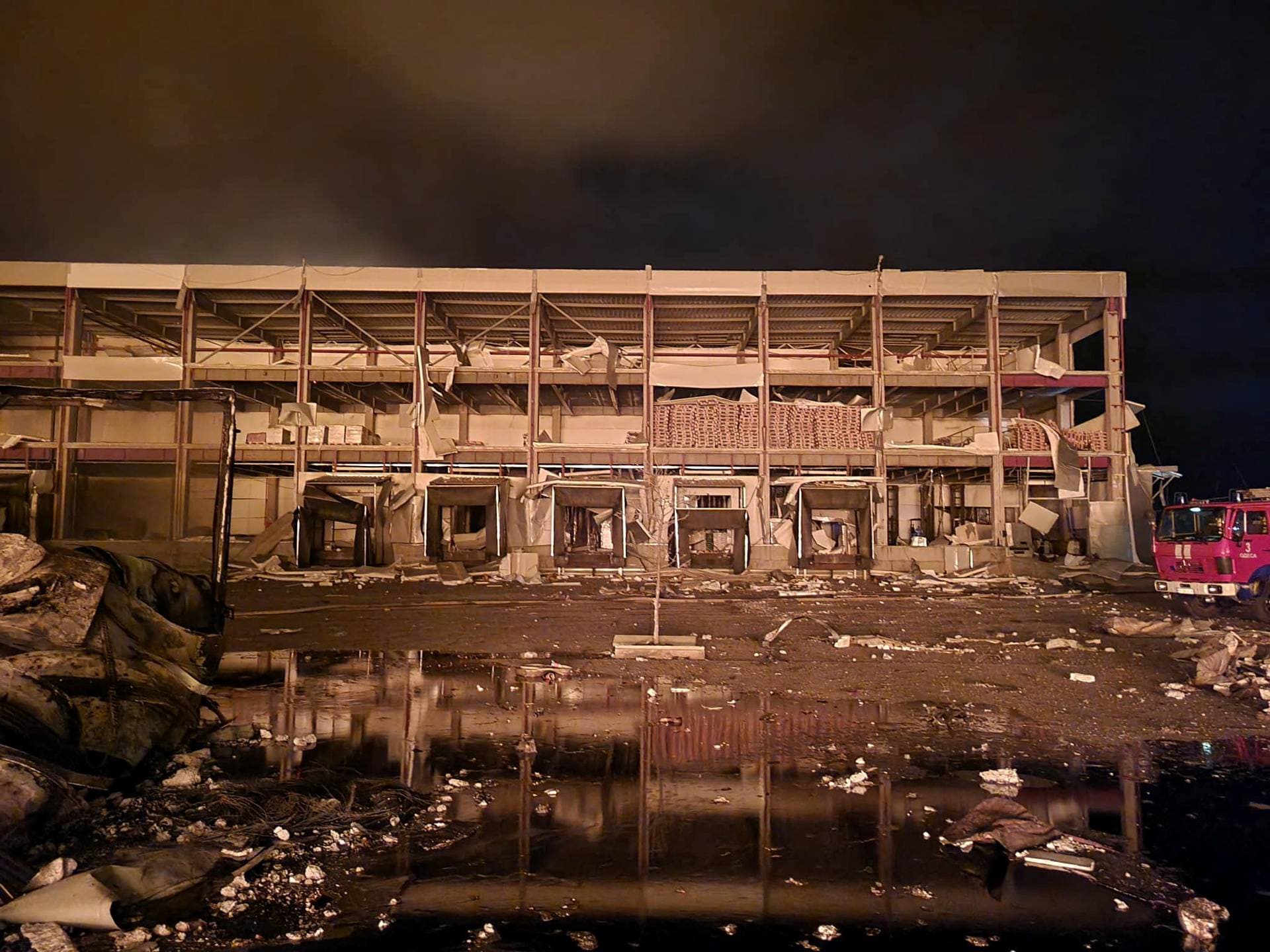 burning storage facilities heavily damaged by a Russian missile strike in Odesa region