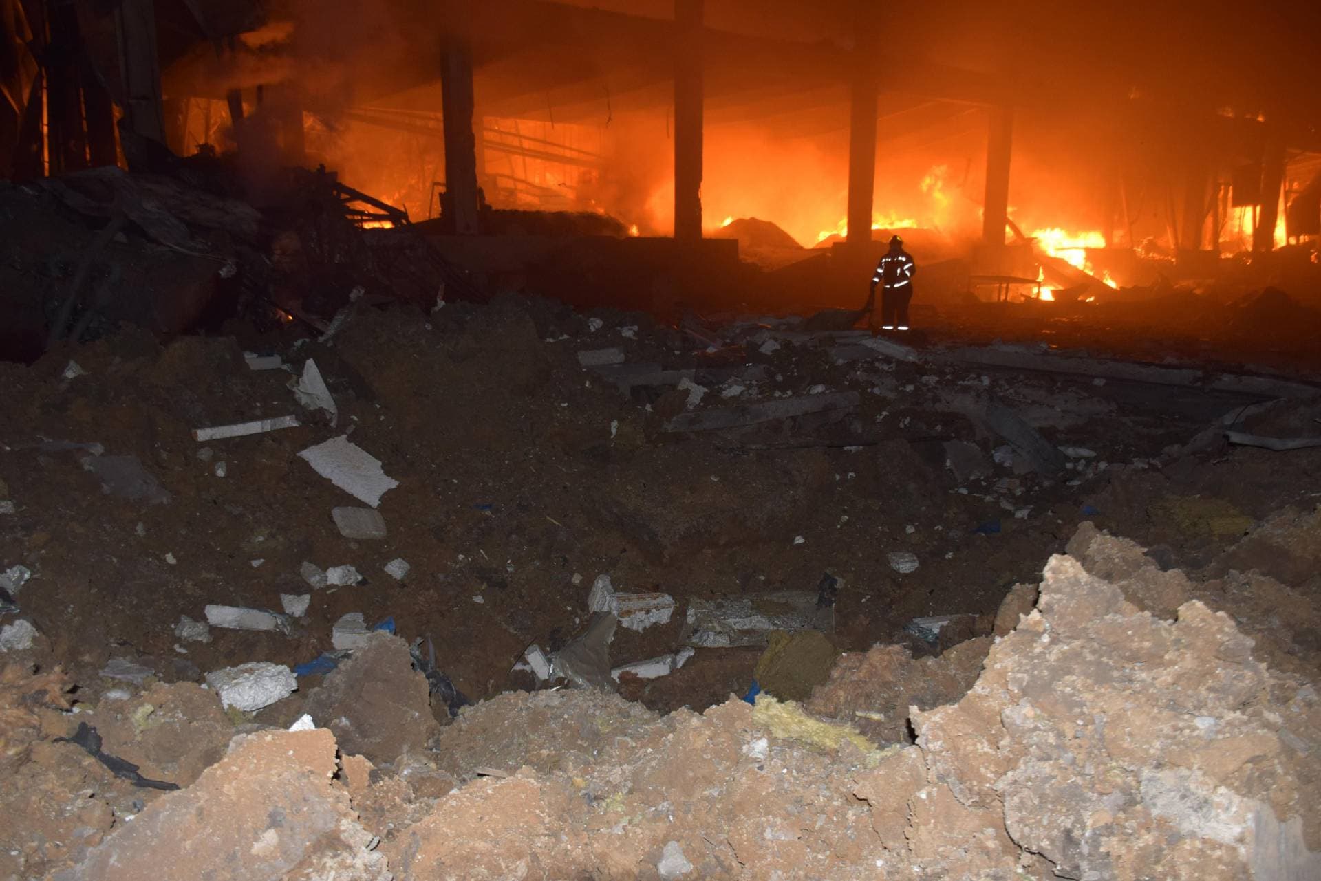 burning storage facilities heavily damaged by a Russian missile strike in Odesa region
