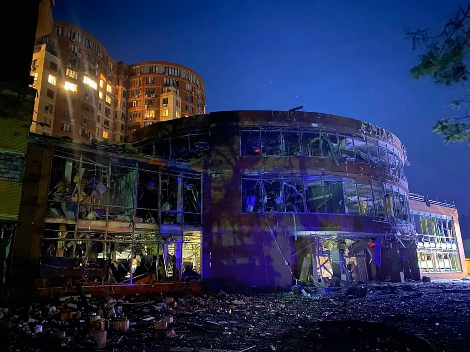 This shows a damaged building after a Russian rocket hit in Odesa