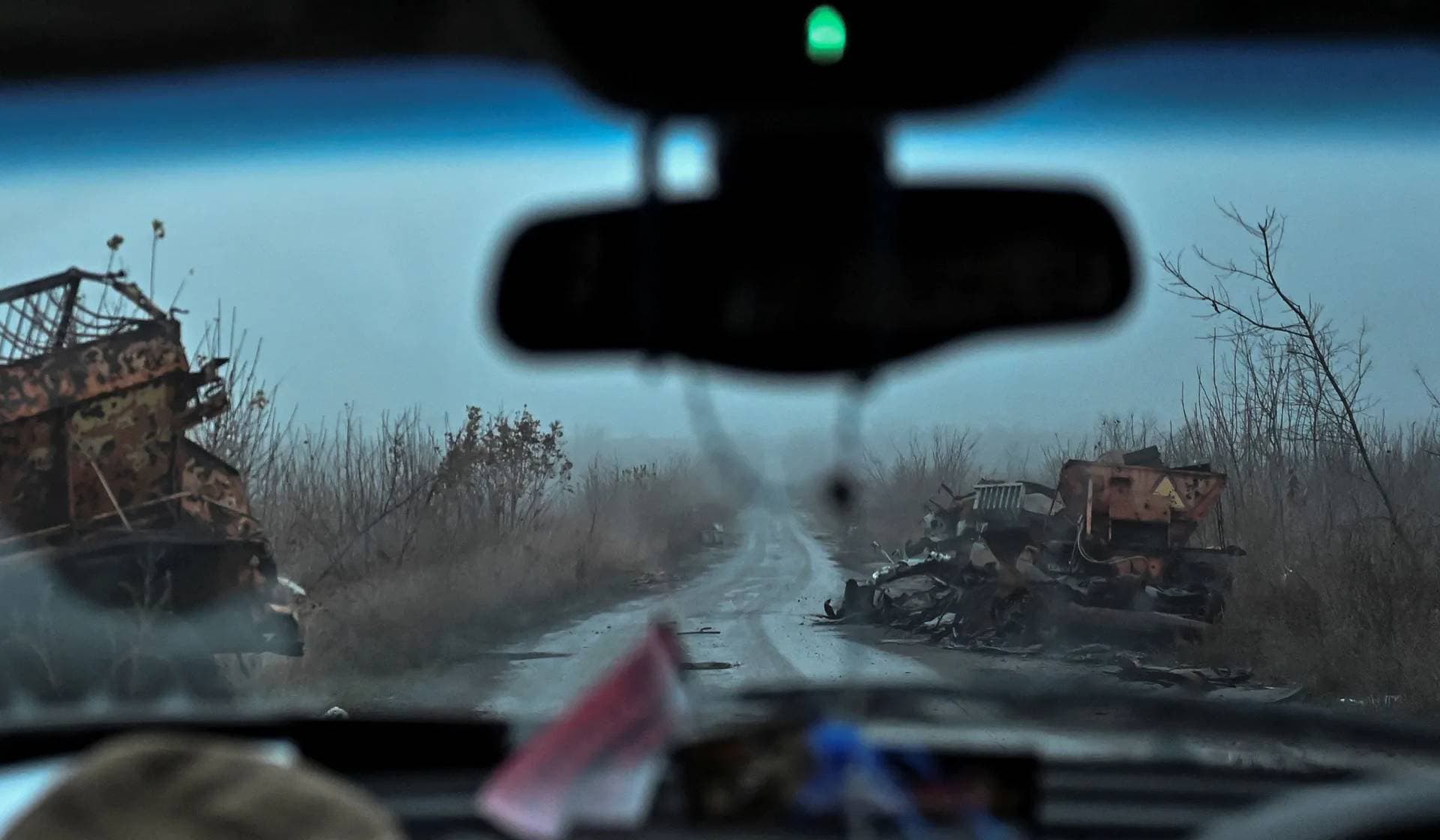 Destroyed vehicles along a road near the village of Robotyne