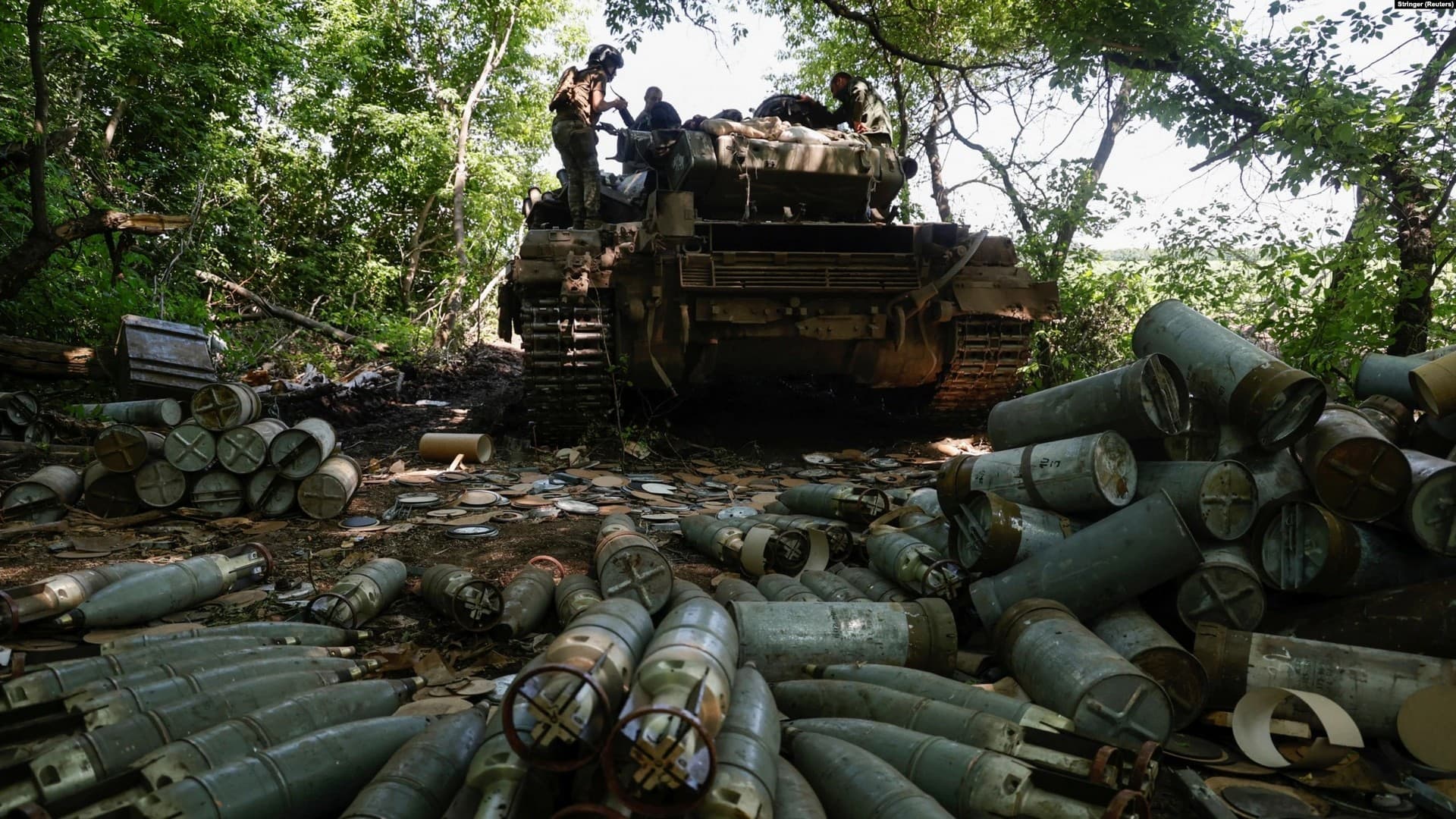 A Ukrainian soldier stands in a position during heavy fighting on the front line in Severodonetsk