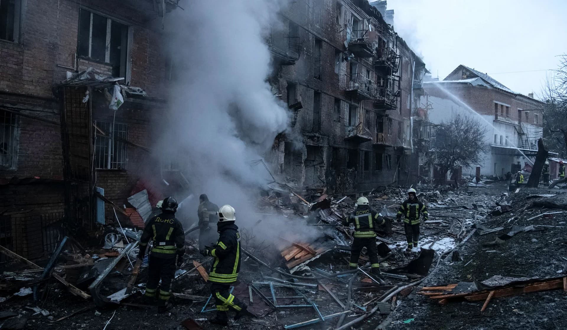 Rescuers work at a site of a residential building destroyed by a Russian missile attack in Vyshhorod