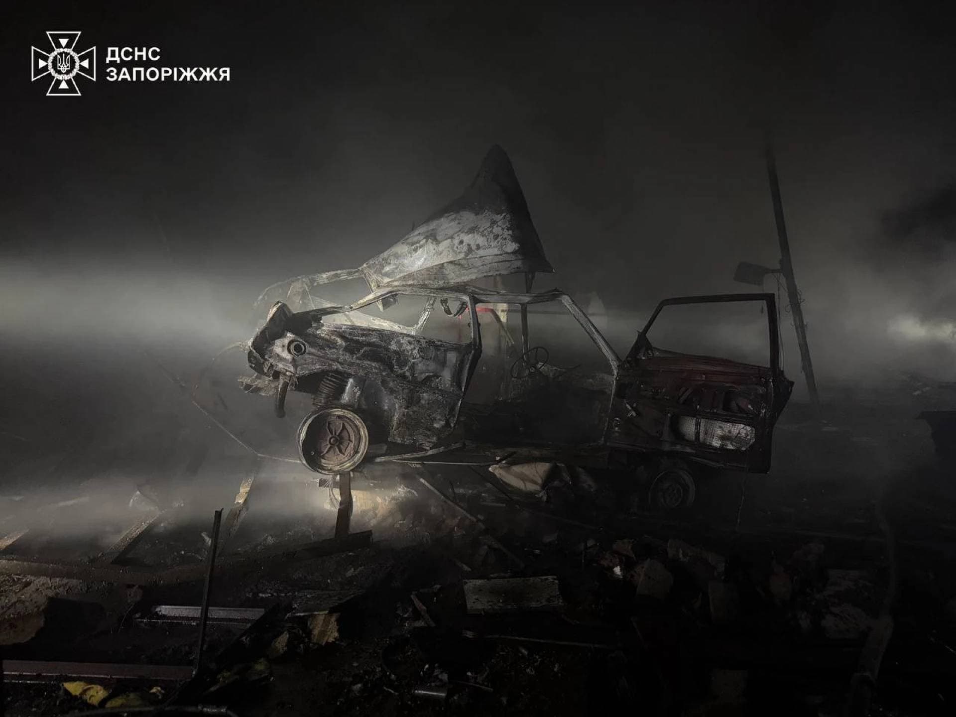 A burned car at the site of a Russian air strike in Zaporizhzhia