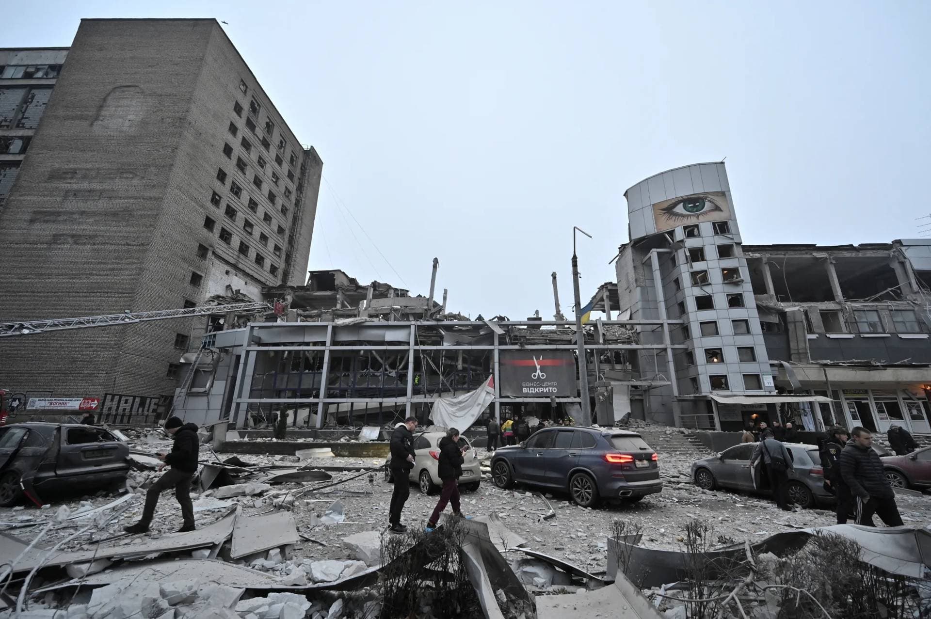 Rescuers work at the site where a building was heavily damaged by a Russian missile strike in Zaporizhzhia