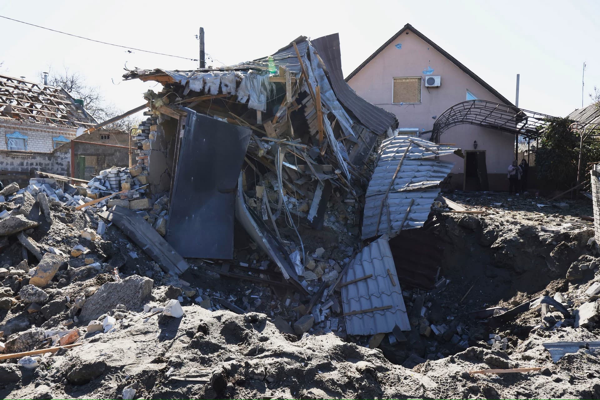 A view of a building destroyed by Russian shelling at night in Zaporizhia